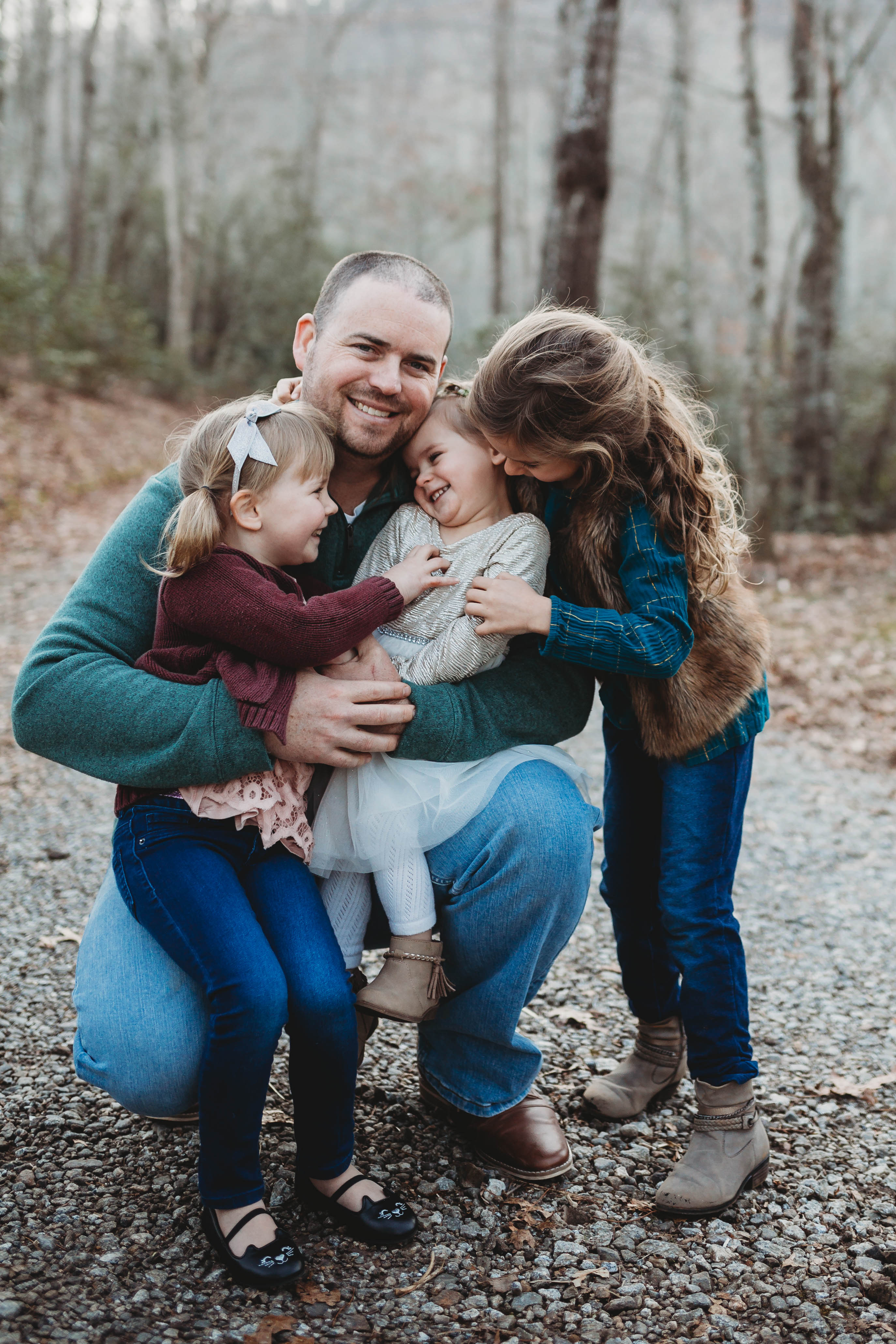 dad with kids laughing