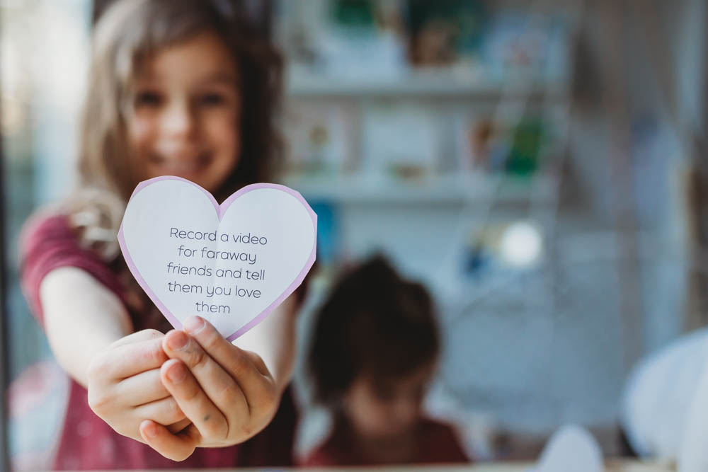 holding heart for valentine's day countdown game